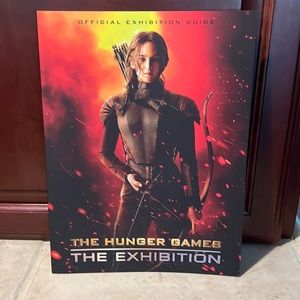 2015 official Hunger Games Exhibition book.   Collector’s item